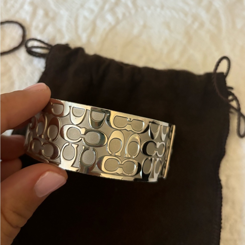 Silver 3D raised coach logo bangle